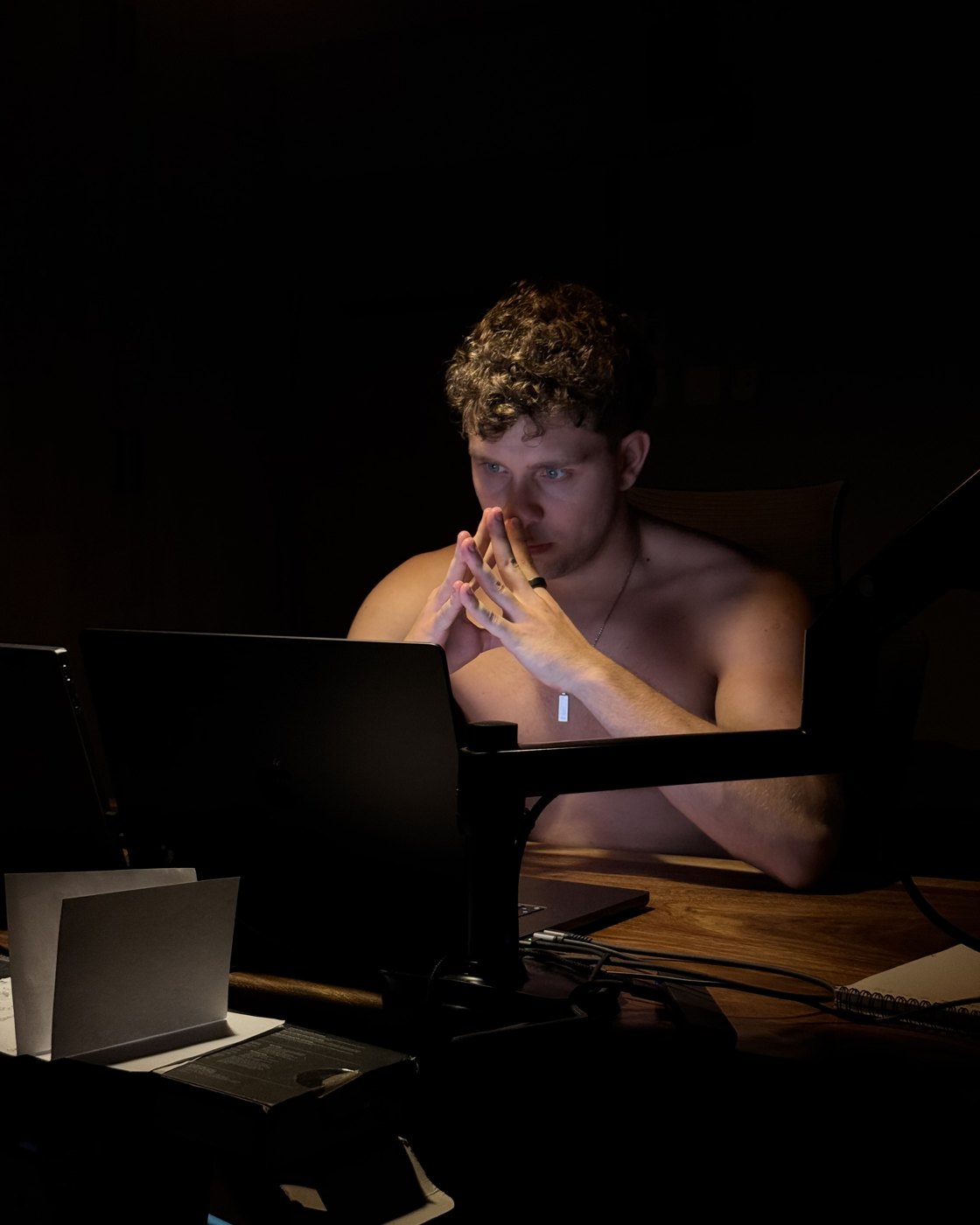 Krystian working late at a laptop