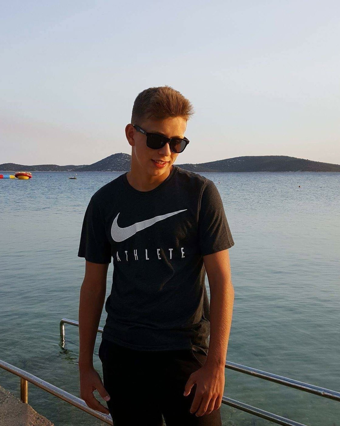 Krystian as a teenager by the sea